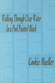 Walking through clear water in a pool painted black